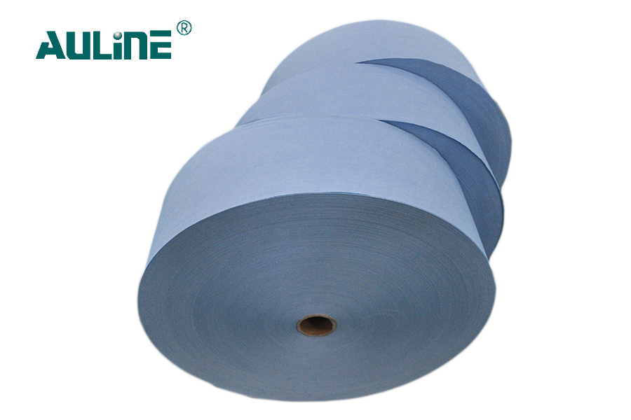 What are the physical properties of woodpulp spunlace nonwoven, such as strength, absorbency, and softness?